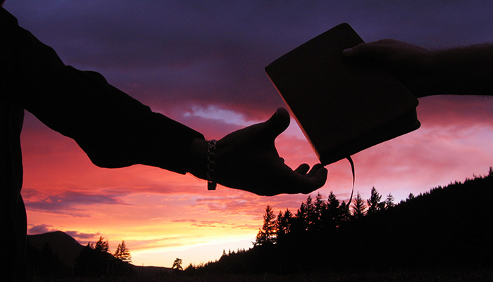 Bible, hand, silhouette, sharing, evangelism, sunset, giving, sharing