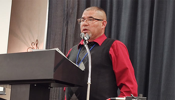 Pastor Jose Aremenia of Mision Bautista, Rogersville, gives a devotional challenge during the opening session of the 2023 Bivocational Ministers an Wives Retreat.